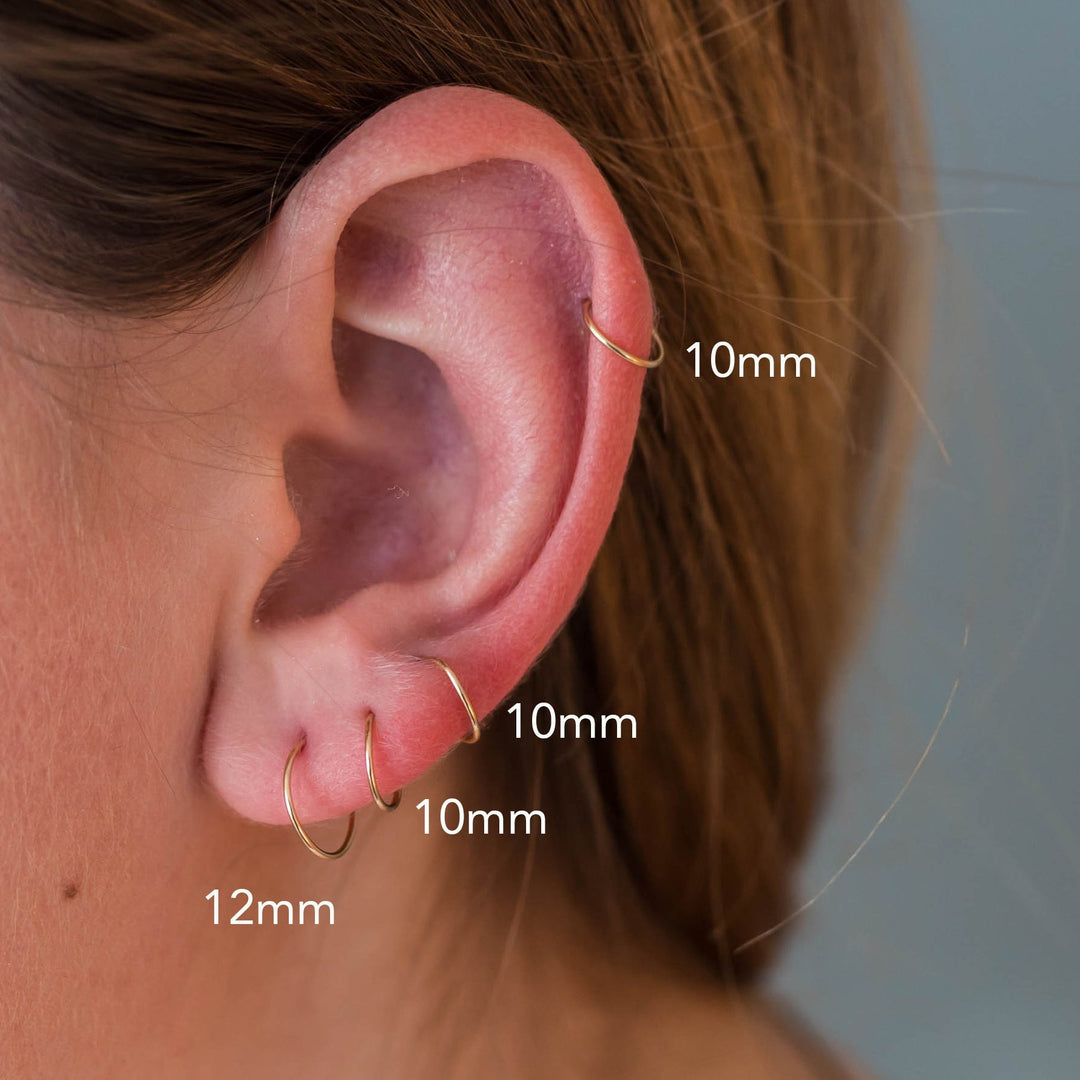 Measuring your ears to know which size of Sunlight Silver hoop earrings is right for you