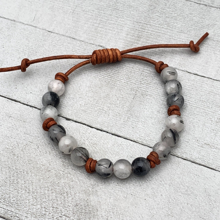 Black and White Rutilated Quartz Leather Bracelet – Boho Adjustable Crystal Jewelry - Unisex Gift For Him or Her - SunlightSilver