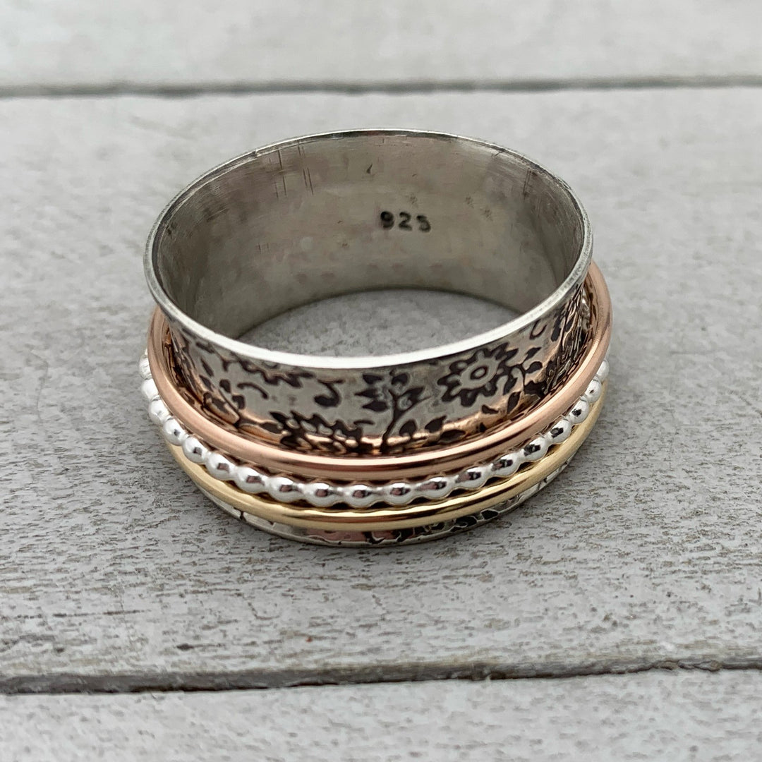 Sterling Silver Flower Spinner Ring with Yellow and Rose Gold Fill. Size 9.5 US
